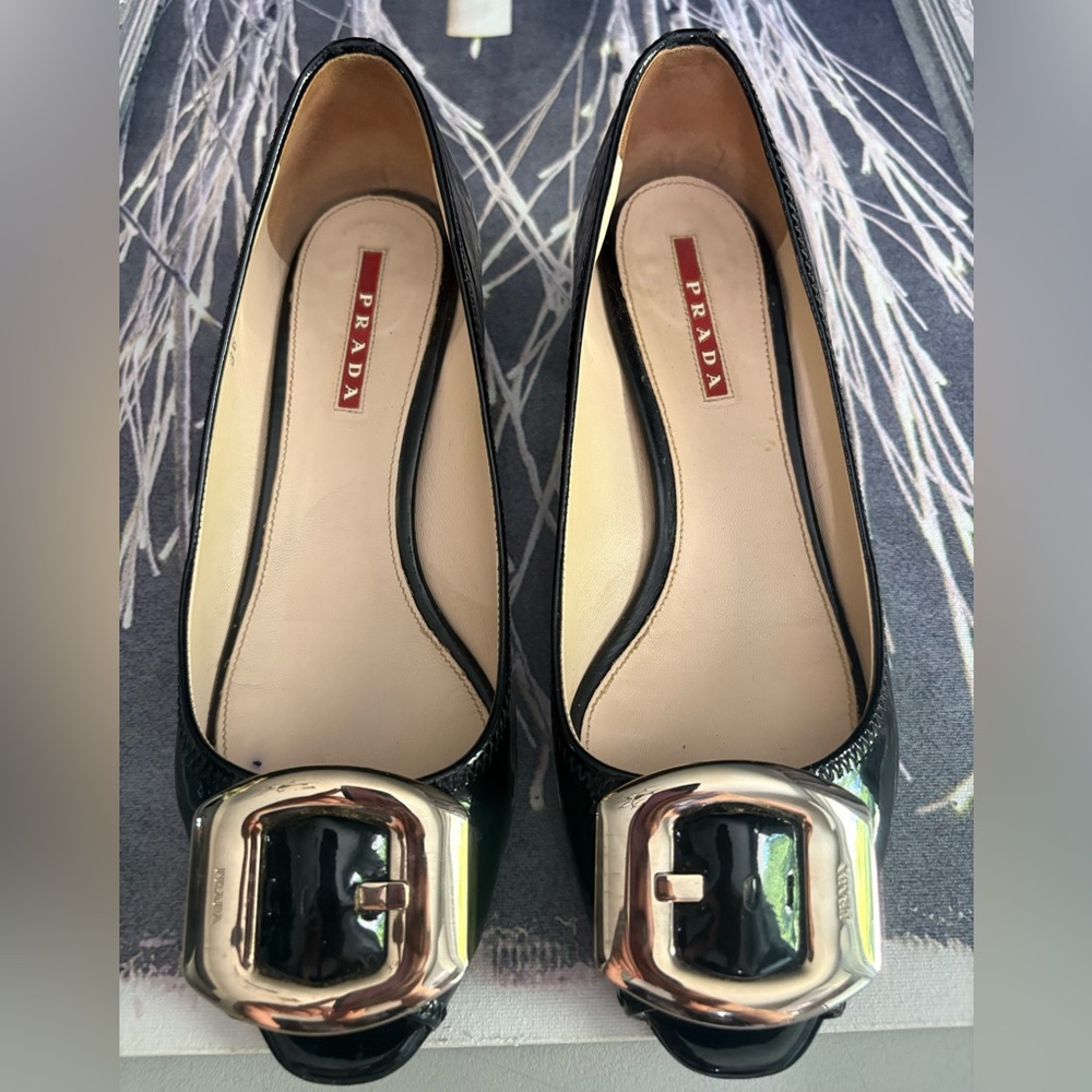 Prada Black Patent Leather Low heel Pumps with silver monogrammed buckle US 6